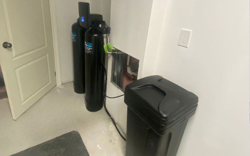 Whole house water softener installed at main water entry point for full-home protection Whole house water softener installed at main water entry point for full-home protection
